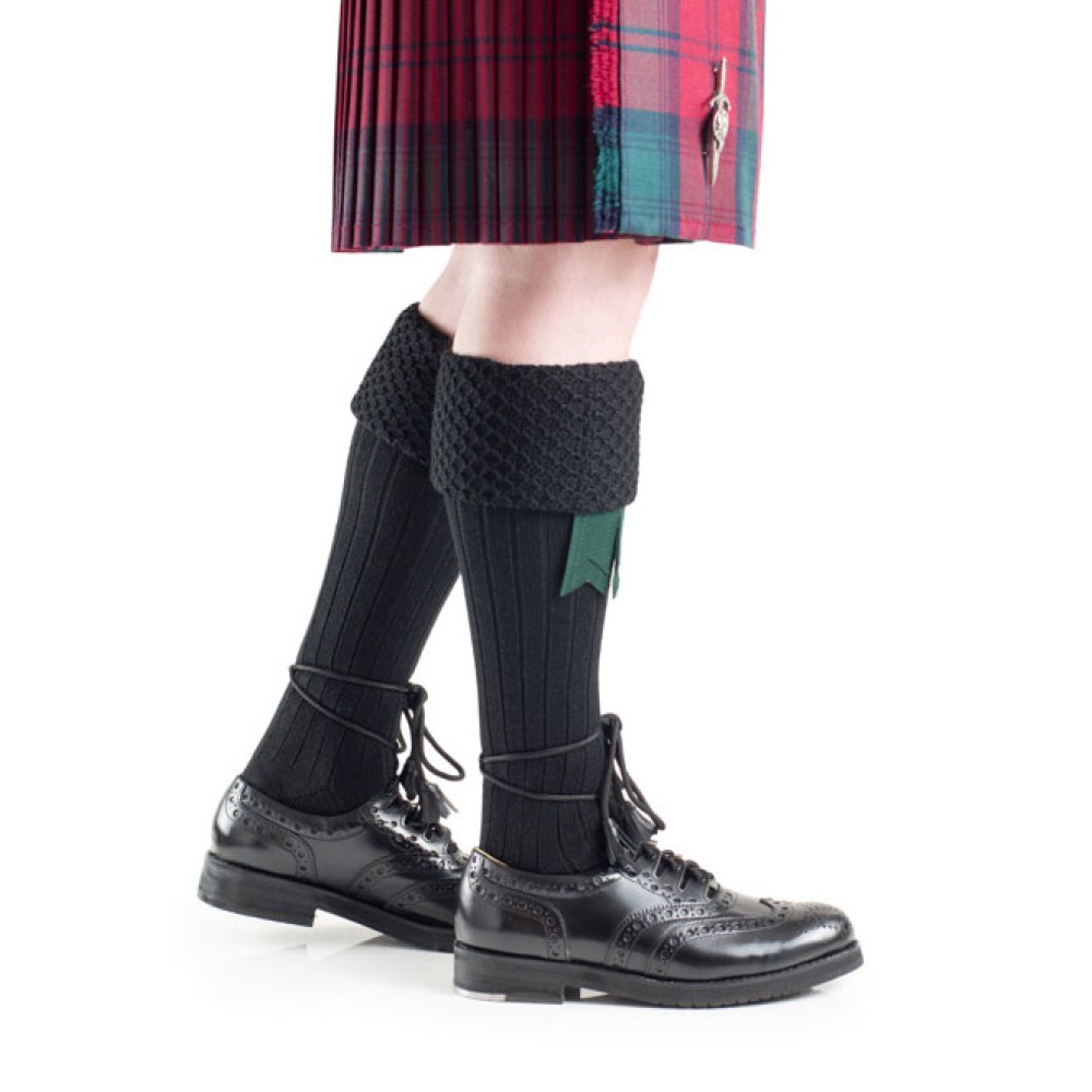 Black piper kilt hose, front view