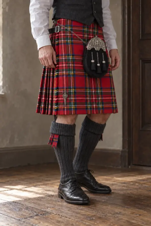Royal Stewart kilt with plain black leather straps, chrome buckles and a Gaelic Themes thistle kilt pin